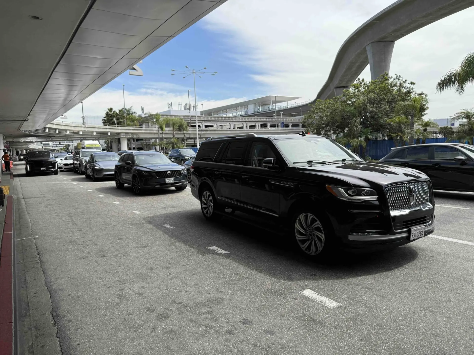 Business traveler using Emelx corporate chauffeur transportation