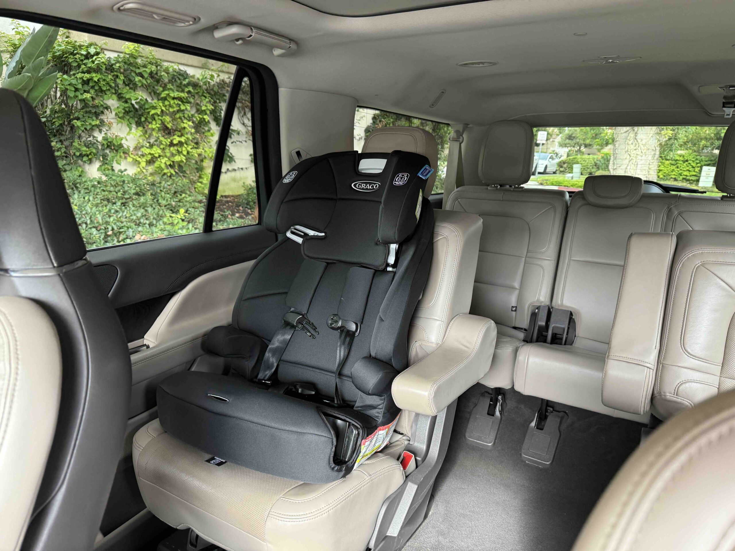 LAX to Irvine car service with child seats traveling with kids airport transportation Emelx